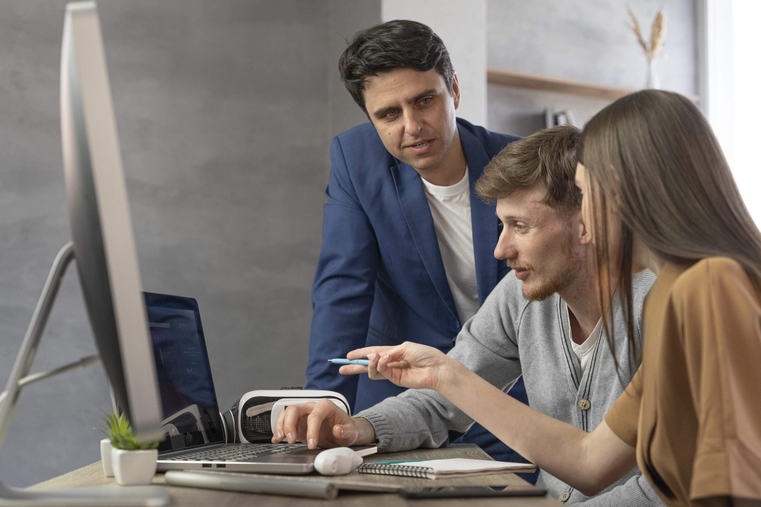 side-view-team-professionals-working-with-new-technology-computer-laptop